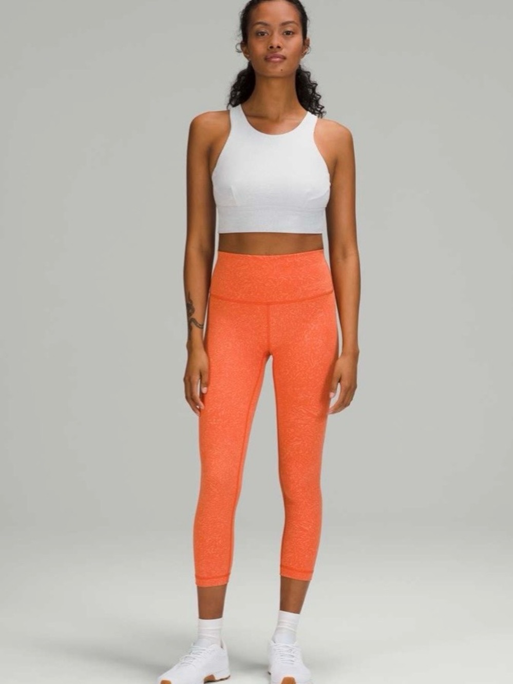 Lululemon Wunder Train High-Rise Crops. Heathered/ Textured Orange Pattern
